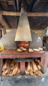 Open Fire Bread Baking, Cusco Restaurants Peru www.travelvivir.com